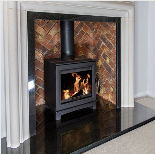 The Loughrigg- a black iron cast wood burning stove with large window. 4.9 kW