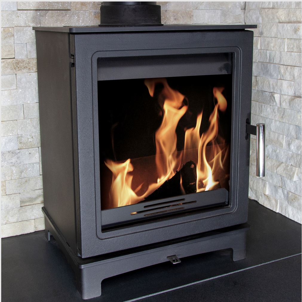 The Skiddaw Wood burning stove, 5kW. Black cast iron stove with large glass panel. - ECODesign 2022, Smoke Control Area Exempt, 85.1% Efficient, A+ Energy Rating, 13% Dust.