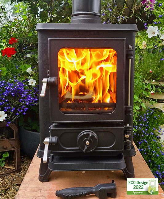 The Hobbit Stove is a small cast iron multi-fuel stove that is able to burn wood, coal, or eco logs, and it fully complies with the new Eco Design 2022 regulations, which makes it suitable for any installations after the 1st January 2022. 