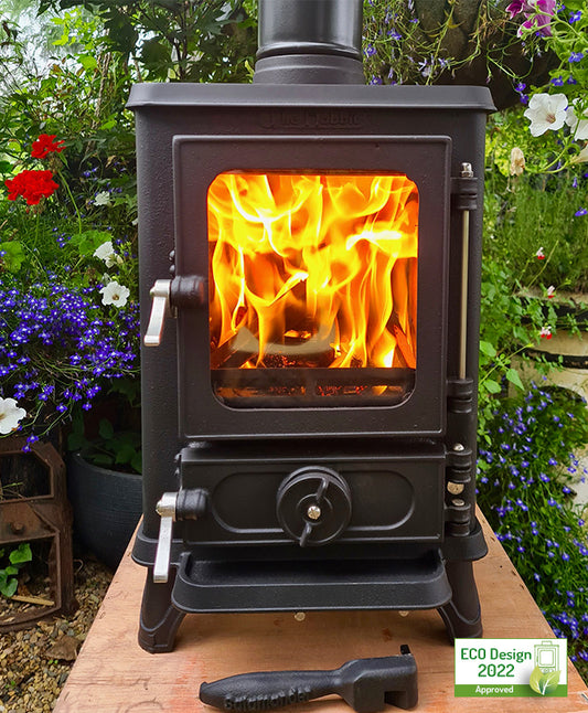 The Hobbit Stove is a small cast iron multi-fuel stove that is able to burn wood, coal, or eco logs, and it fully complies with the new Eco Design 2022 regulations, which makes it suitable for any installations after the 1st January 2022.